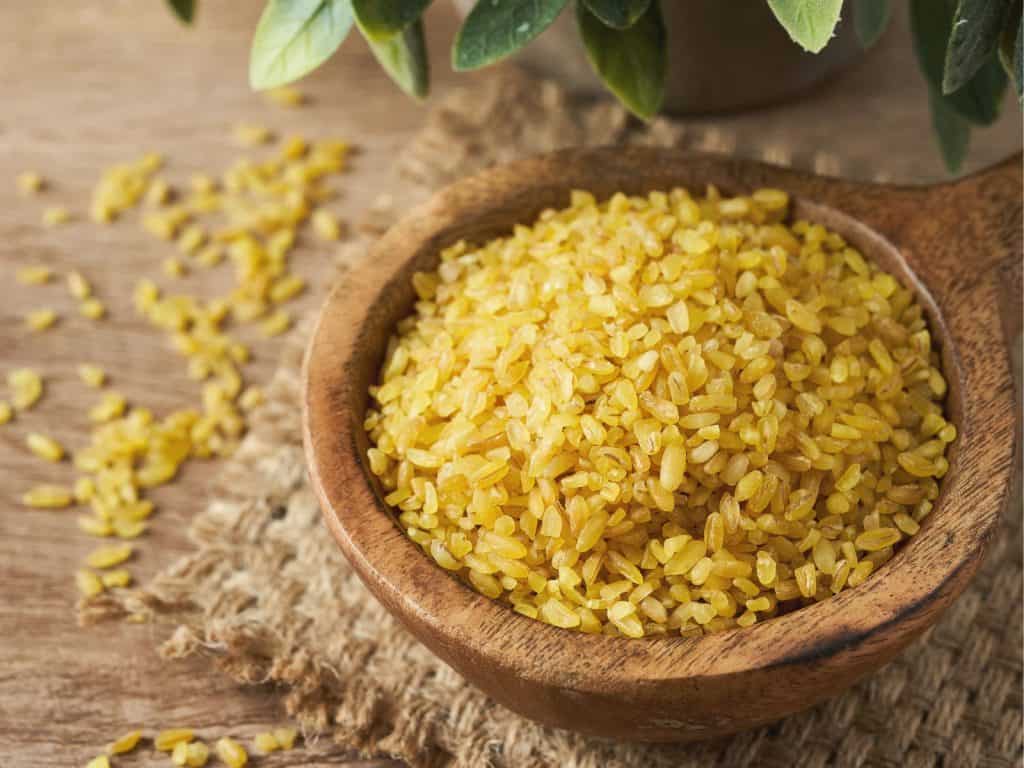 bulgur durum wheat on wood table