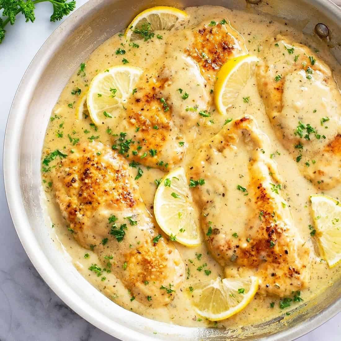10. Crispy Chicken Thighs with Creamy Garlic Sauce