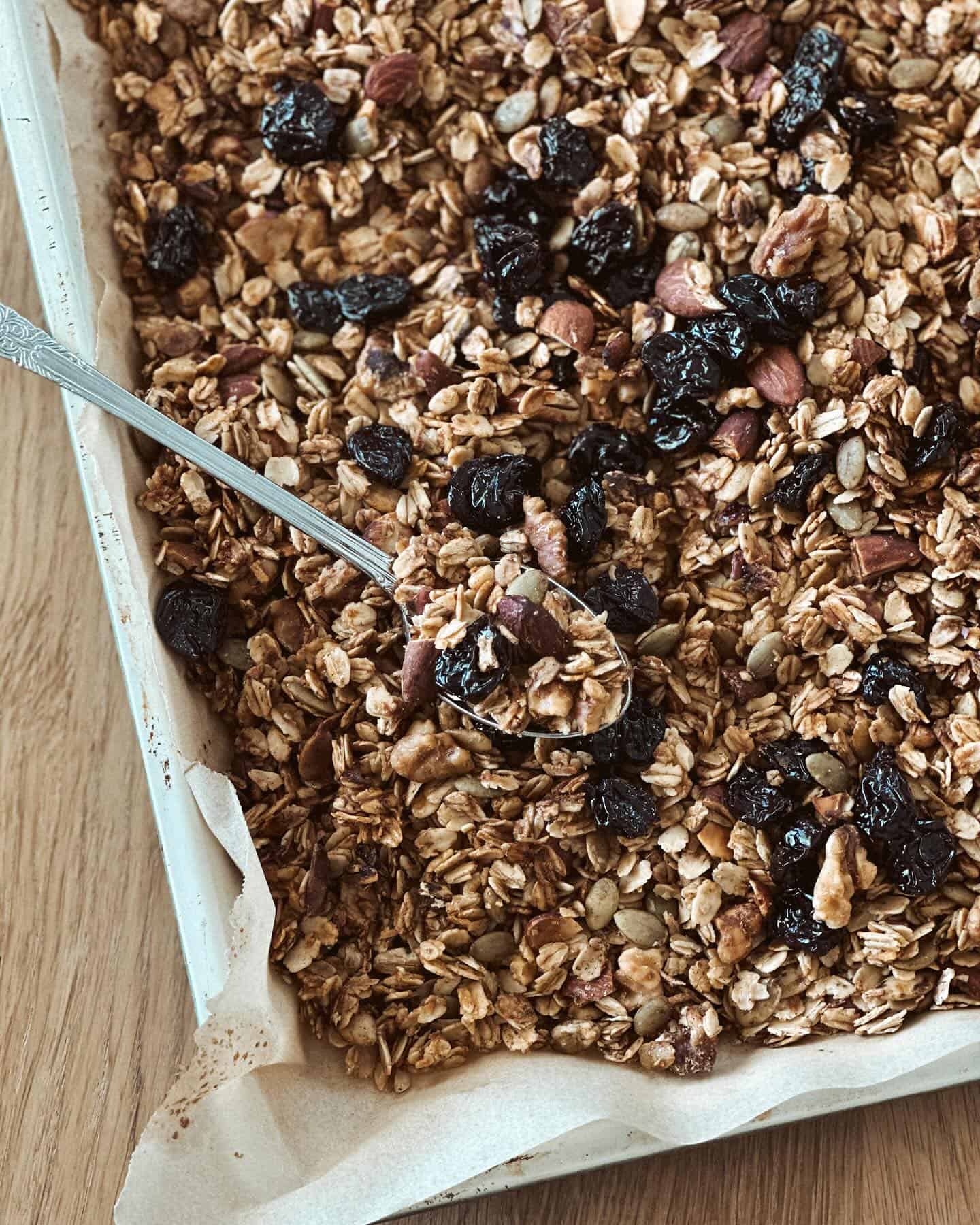 granola-in-baking-pan granola mixture in baking pan