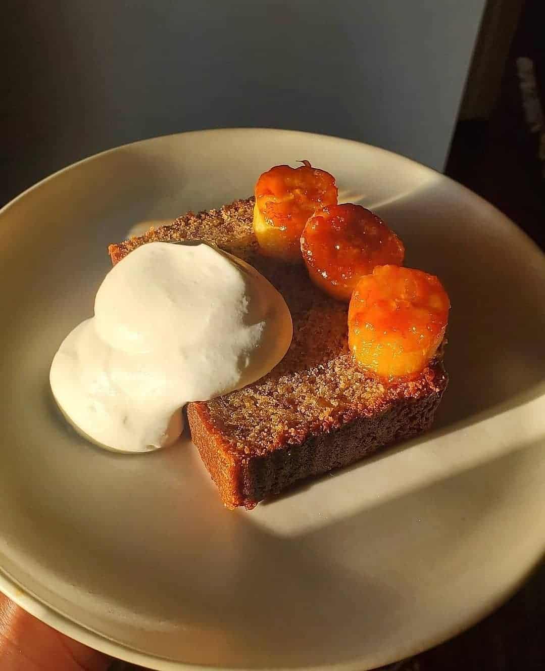 slice of banana bread served with vanilla ice cream