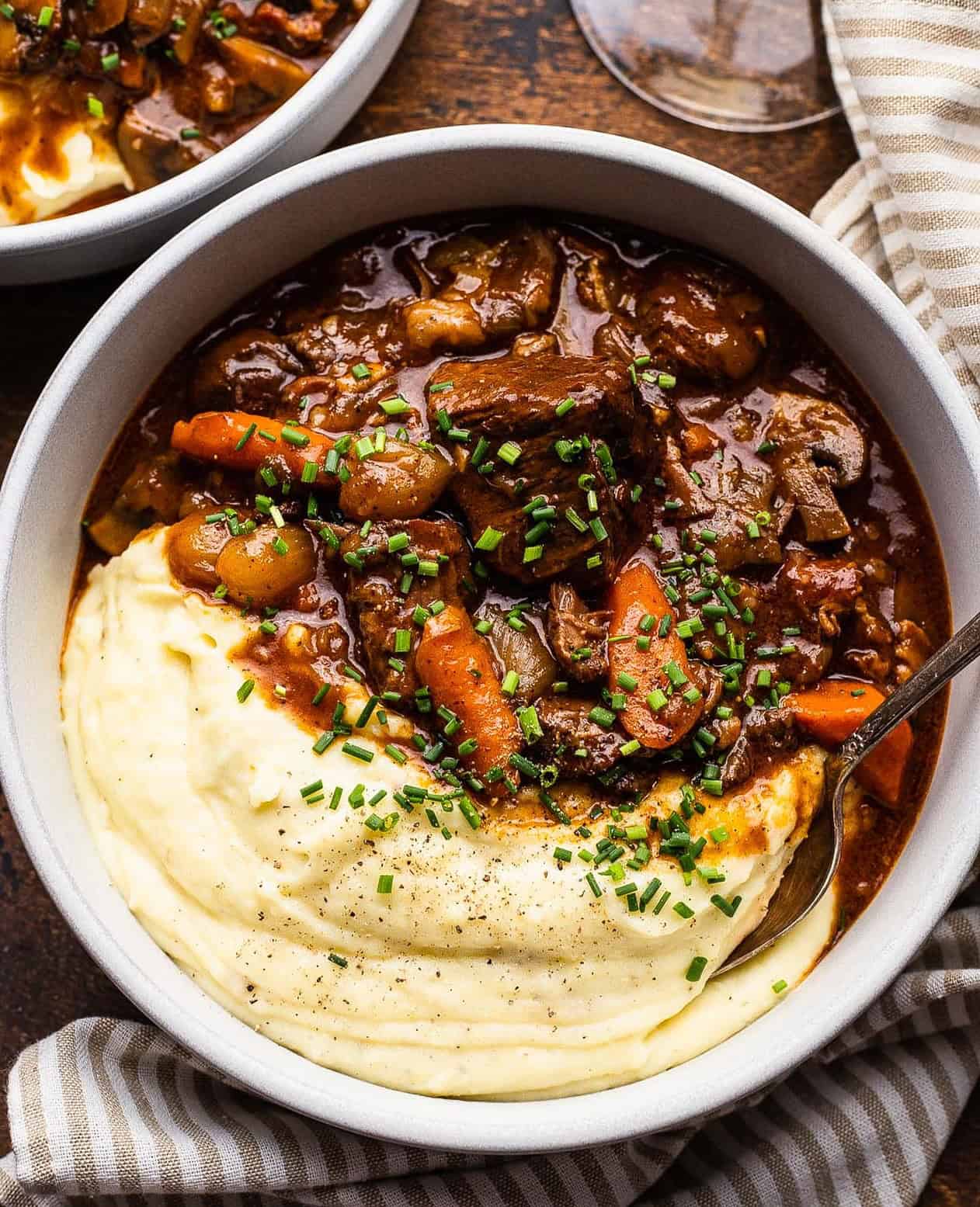beef bourguignon served with mashed potatoes